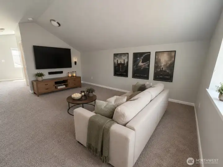 Versatile bonus room with endless possibilities for a media room, game room, or playroom