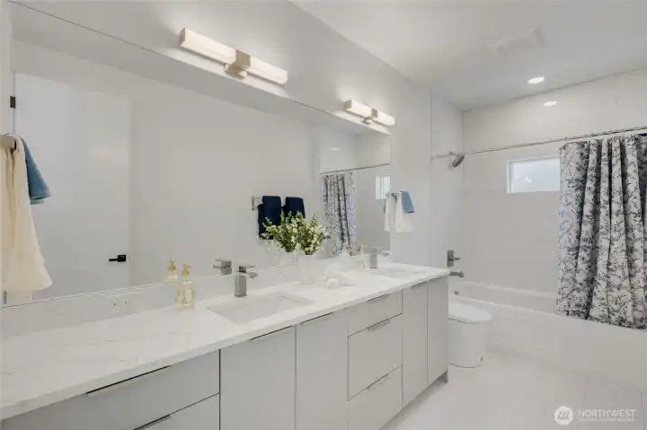 2nd floor full bath with heated floors and high end toilets. 2nd floor full bath with heated floors and high end toilets.