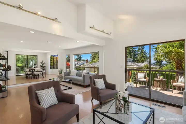 Designed for both connection and comfort, the open-concept main level flows effortlessly from living to dining to outdoor entertaining. Defined gathering spaces create a sense of purpose while preserving the light, airy feel that makes this home so inviting.