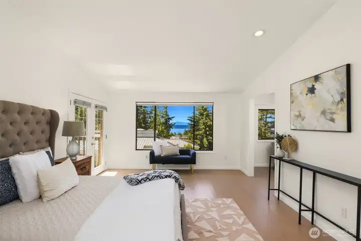 The upper floor is dedicated to the Primary Suite. You deserve to wake up to incredible views towards Lake Washington