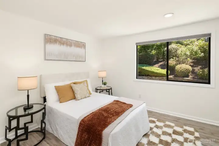 The main level is also home to bedroom, with adjacent full bath
