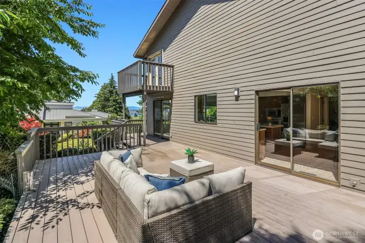 A very generous deck that can accommodate large conversational patio sets, a fire pit, outdoor heaters and grill making this a great summer hangout spot.