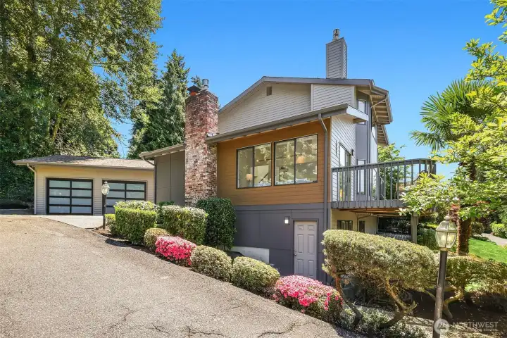 Plenty of parking both outside the garage or on the extended driveway. There's also two additional spots on 114th that can be enjoyed by the whole community