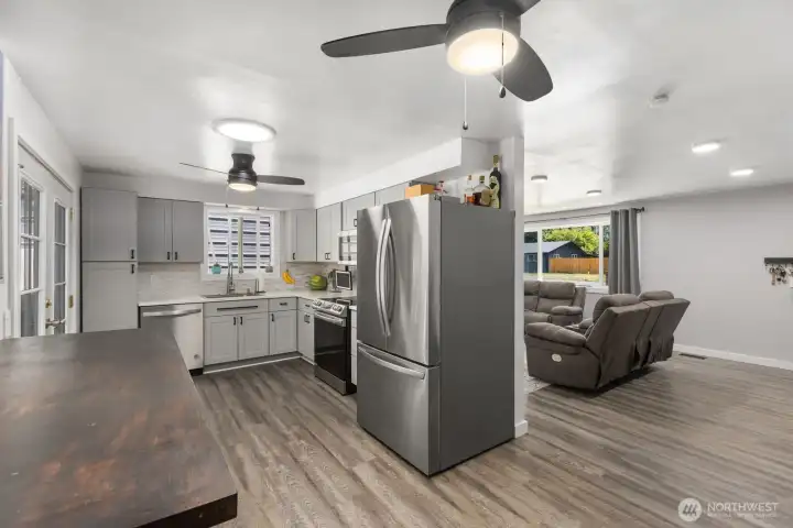This view shows the recently updated kitchen and looking into the main living area