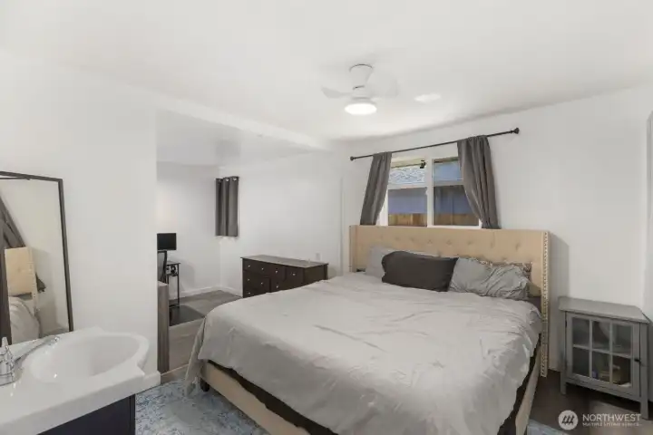 The master  is spacious with two connecting rooms.
