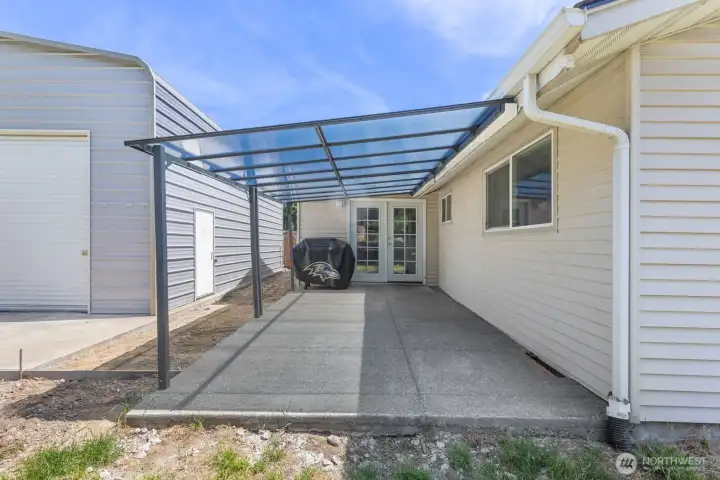 another view of the patio and shop