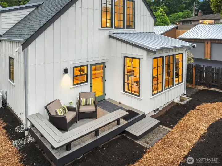 A fully fenced rear yard with gated entry is just right for your pets and personal gardening. The rear deck is surrounded by a custom bench for extra seating. A fully fenced rear yard with gated entry is just right for your pets and personal gardening. The rear deck is surrounded by a custom bench for extra seating.