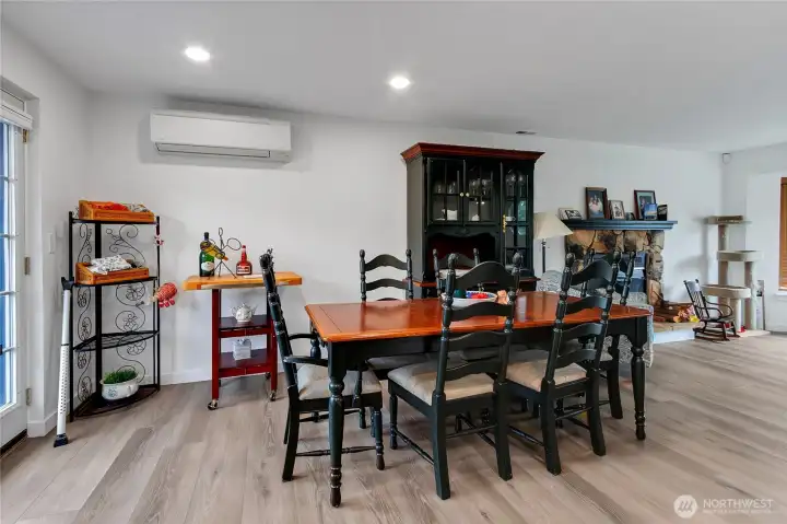 Dining area with door to the deck on the left. Dining area with door to the deck on the left.