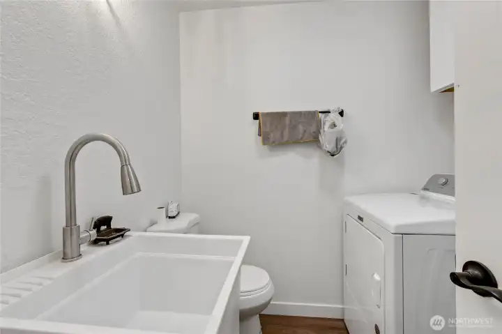 Laundry room with sink. Laundry room with sink.