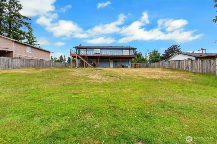 Backyard further away from the home. Backyard further away from the home.