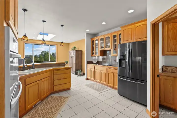 Kitchen with glass cabinet doors. Kitchen with glass cabinet doors.