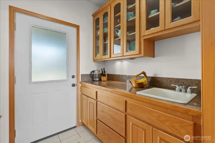 Butlers pantry with bar sink. Butlers pantry with bar sink.