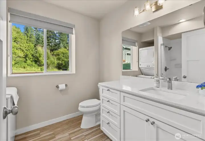 Bathroom and laundry featuring heated flooring. Bathroom and laundry featuring heated flooring.