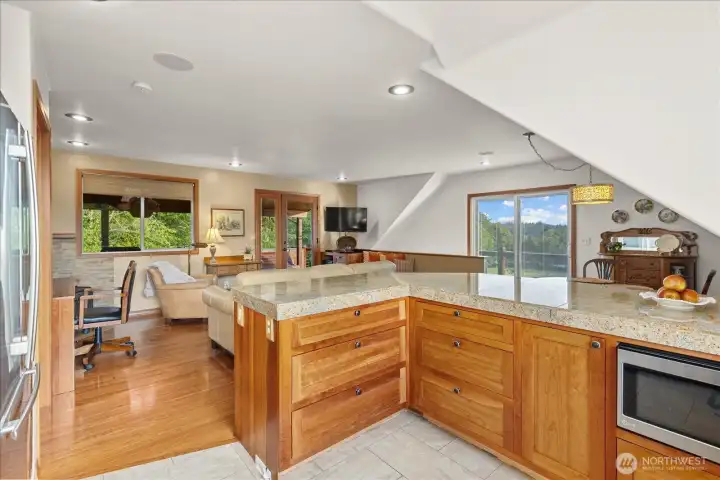 Large office space showcasing granite tile counters. Large office space showcasing granite tile counters.