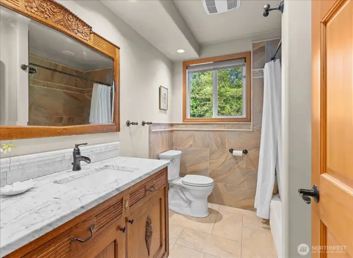 Antique bathroom vanity featured in the full bathroom. Antique bathroom vanity featured in the full bathroom.