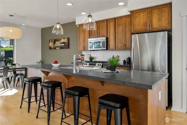 Stainless steel appliances highlight the kitchen.
