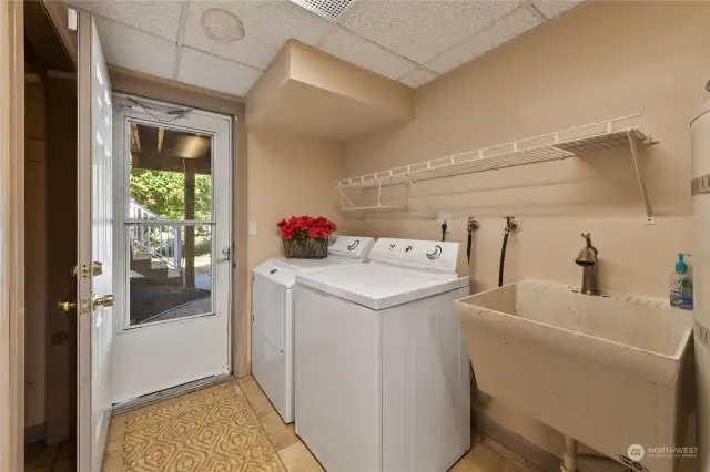 Utility room with access to large patio