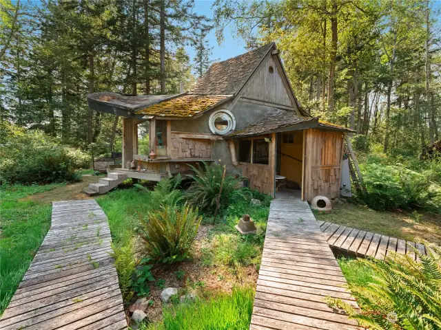 Unfinished & unpermitted straw bale shop, but some cool parts to it.