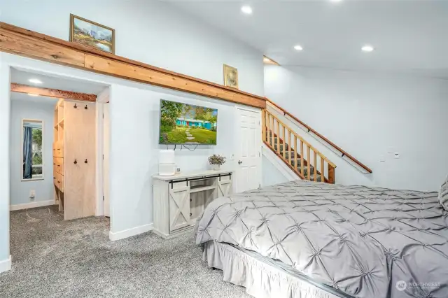 Walk-in closet on left, stairs to loft space on right