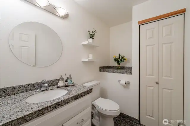 Convenient powder room for guests and day-to-day use
