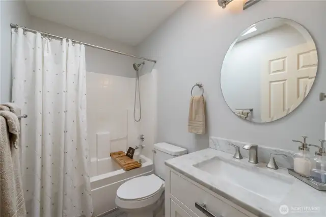 Upper-Level Full Bathroom featuring modern fixtures