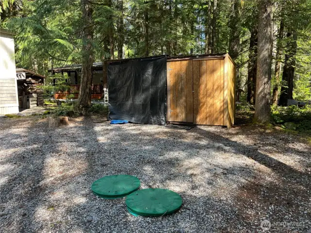 Septic risers and lids in place