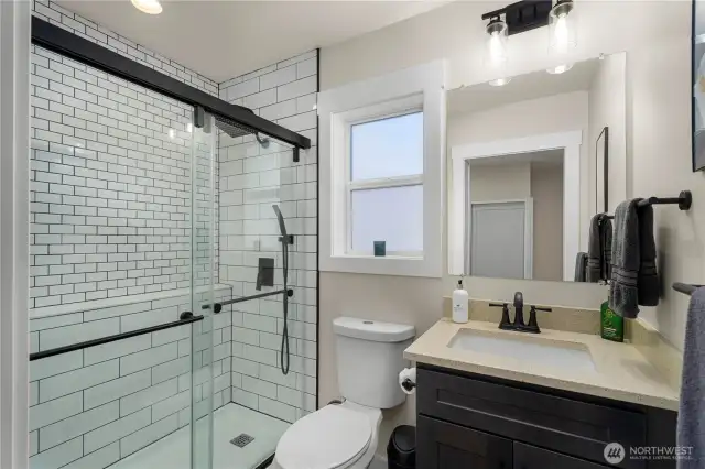 Main floor bathroom attached to bedroom.
