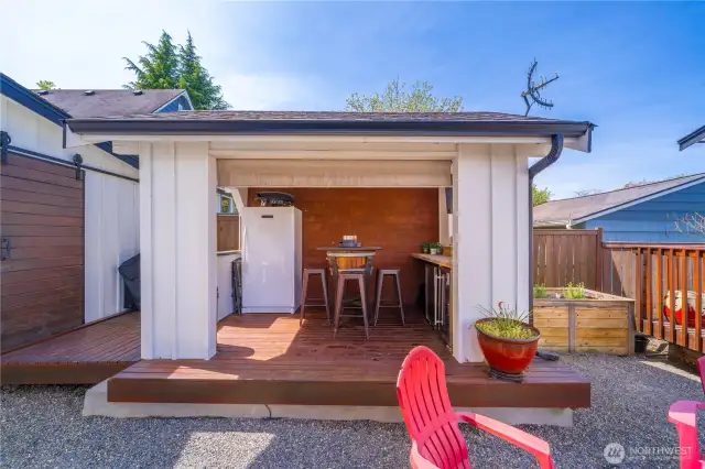 Awesome covered back yard area for all days in the Northwest.  1 wine fridge will stay.