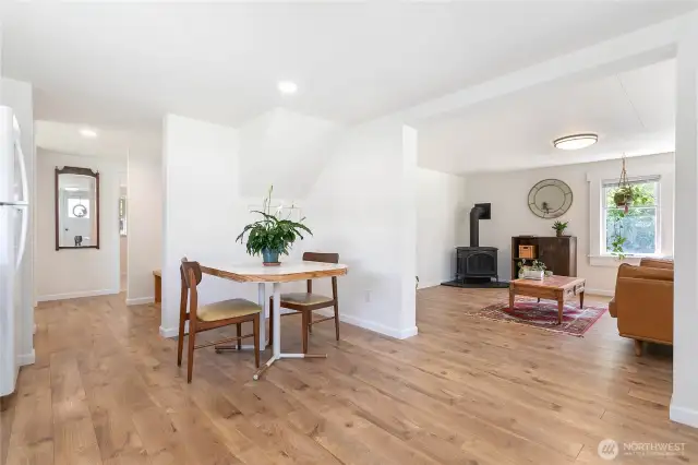 Eating space, view into hallway and into living room