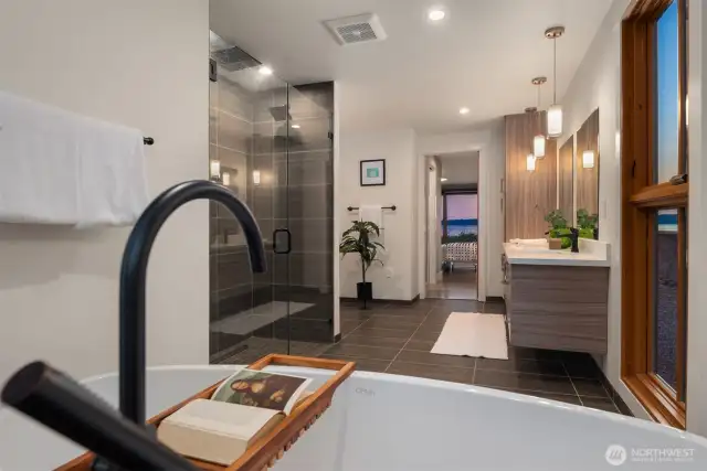 Primary bath with room to relax in full tub and separate shower.