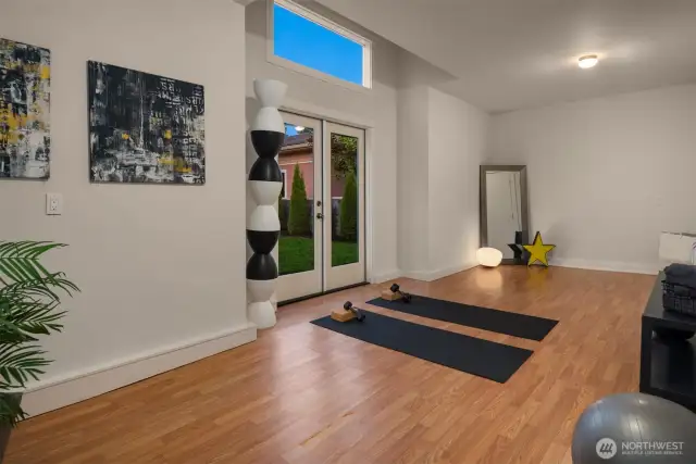 Adjacent space leading to front yard is perfect for work from home or work out space.