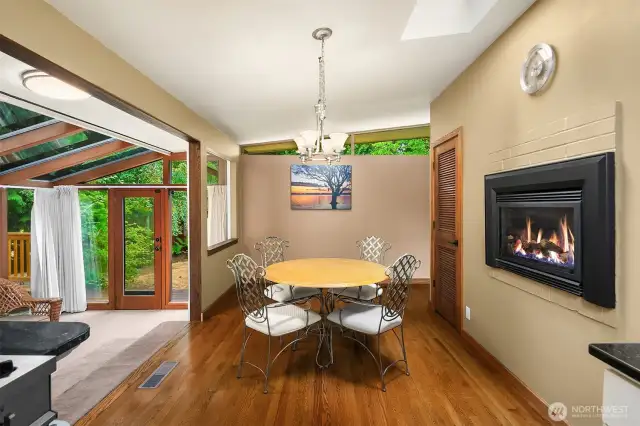 dining room looking back from the kitchen, has fireplace provides great heat!