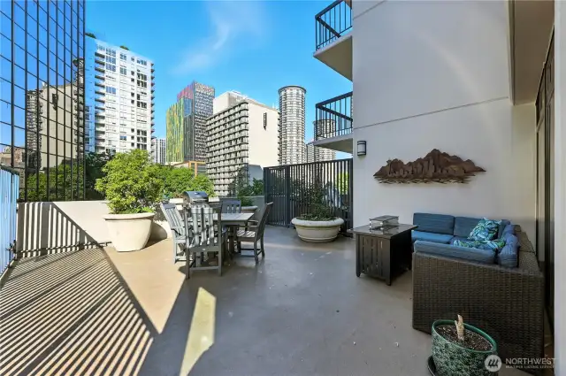 Common area patio with firepit table.