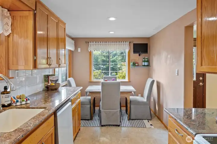 Abundant cabinetry and counterspace, . .