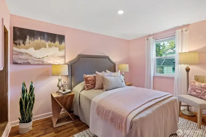 This bedroom has a double-wide closet plus additional storage.