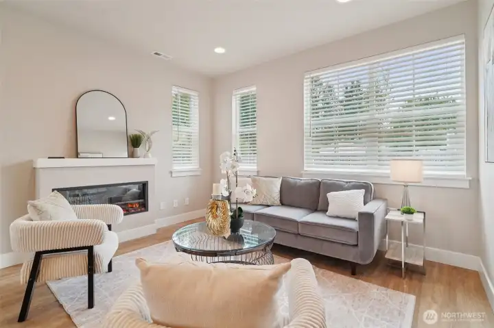 Photos of the staged model home with the same floorplan and similar finishes.