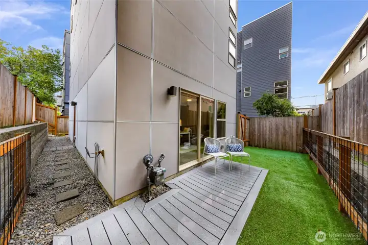 Backyard and side yard provide low-maintenance outdoor space. Excellent for kids, pets, easy enjoyment, etc.