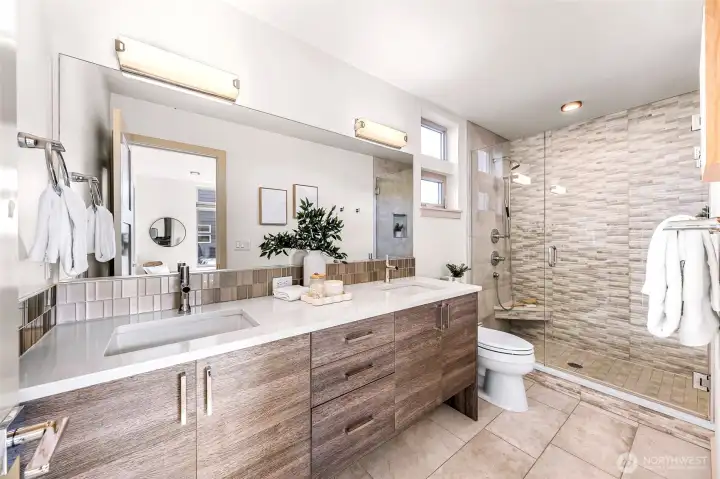 Double vanity and large shower.