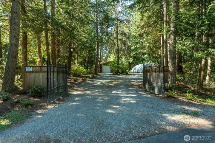 Gated and fenced. Private road.