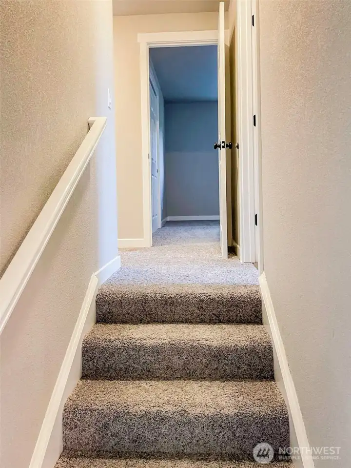UP THE STAIRS TO THE BEDROOMS AND MAIN BATH