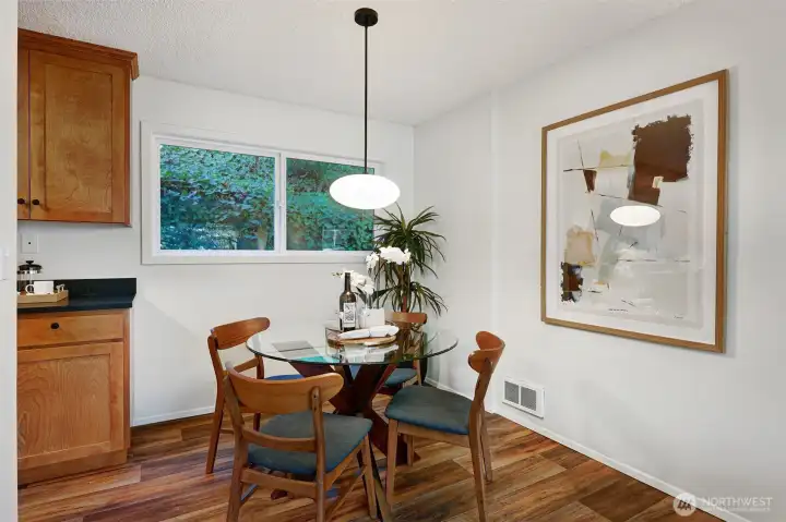 No cramped dining quarters here! There's plenty of room for a full-size dining set in this space.