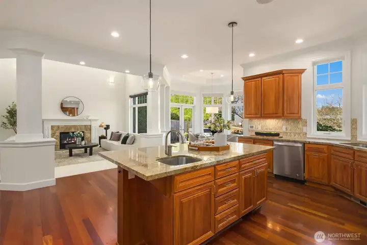 A sleek chef’s kitchen featuring stone counters, designer cabinetry, and top-tier stainless appliances.