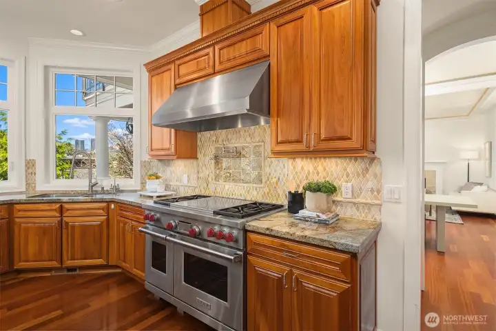 A Wolf oven with a pot filler faucet makes cooking easy.