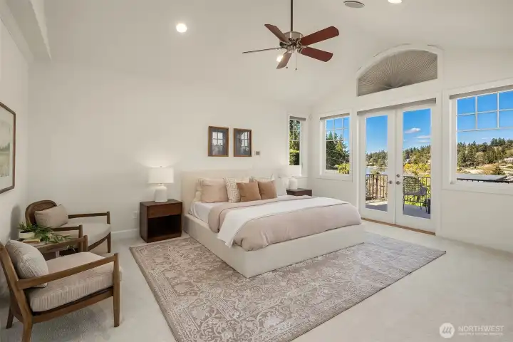 Upstairs, the primary suite captures iconic views of Lake Washington and Bellevue’s skyline.