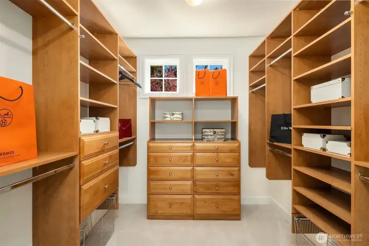 Generous sized walk-in primary closet.