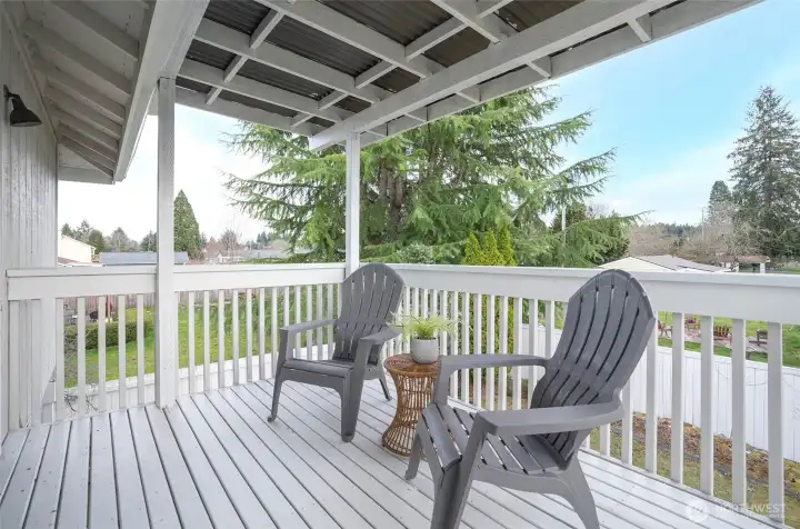 Primary private deck with beautiful kept neighbors yards