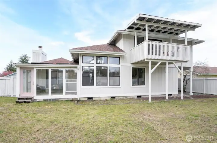 Large yard, fully fenced on a corner lot.