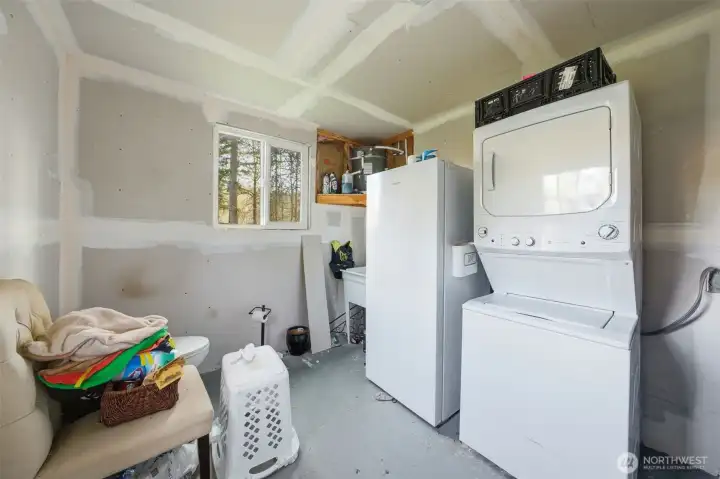 Toilet/sink/washer/dryer, heated room houses water tanks