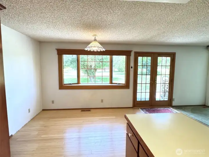 Dining area from the kitchen sink. Dining area from the kitchen sink.
