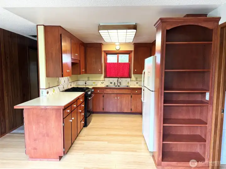 Kitchen--Lower cabinets have pullouts, large double lazy Susan in the right   corner cabinet.